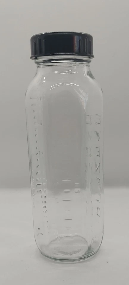 De colección. Biberón de vidrio Pyrex Evenflo 8 OZ con tapa original sin cala ni sello Foto 4 de 4