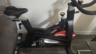 Sunny Upright Indoor Exercise Bike, Adjustable Seat, Black/Red — photo 2