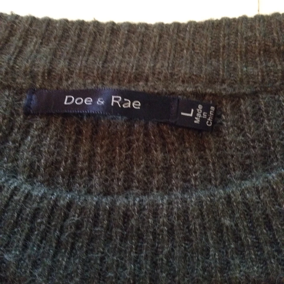 Suéter de punto cerrado de manga larga talla corbata detalles diseño frontal acento damas talla Foto 4 de 4