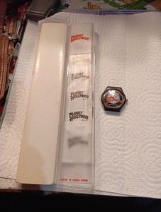 PRE-OWNED PLANET HOLLYWOOD MALL OF AMERICA WATCH NO BAND NEEDS BATTERY W/CASE