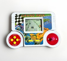 Vintage 1980s-1990s? Grand Prix Handheld Elec...