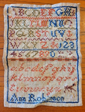 Antique Victorian Needlework Sampler by Ann Robinson. Approx 18.75cm x 14cm.