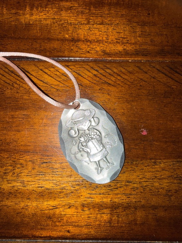 Hand hammered holiday ornament, The Forge