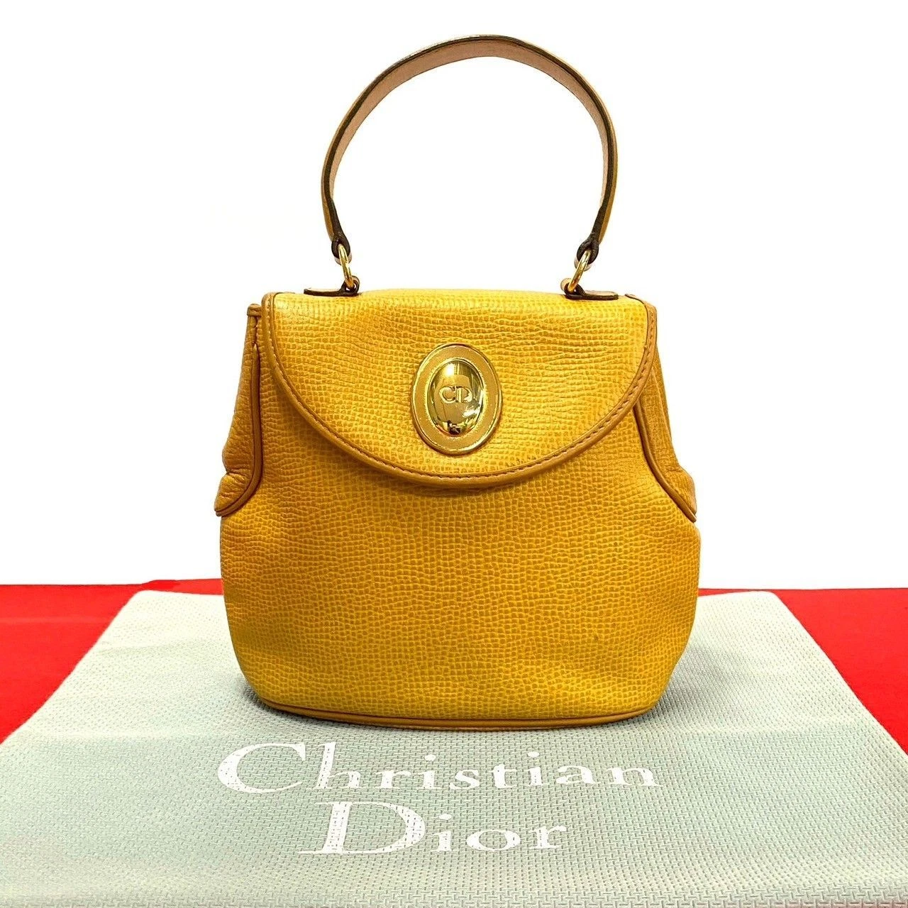 Sac à main Christian Dior vintage en cuir jaune