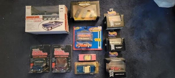 Lot of 10 die cast cars. NIB
