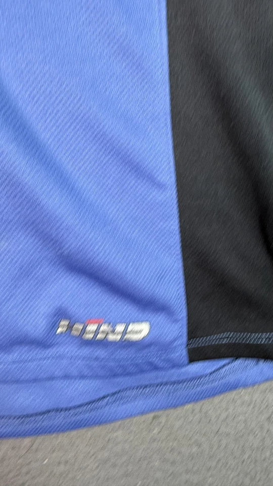 Camiseta deportiva de ciclismo trasera mediana azul negra manga larga media cremallera bolsillos hecha en Canadá Foto 2 de 4