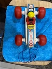Vintage Fisher Price #8 Bouncy Racer 1960 Pull Toy Yellow Helmet