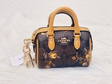 Coach Mini Rowan Bag CharmIn Signature Canvas With Floral Print Walnut/Yellow