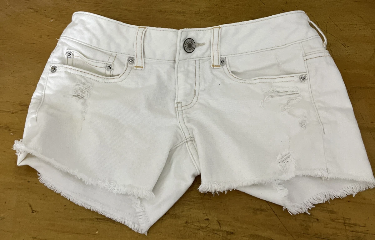 White jean shorts best sale ripped