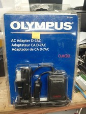 NEW SEALED Olympus AC Adapter D-7AC Charger, Power Supply Package Damaged