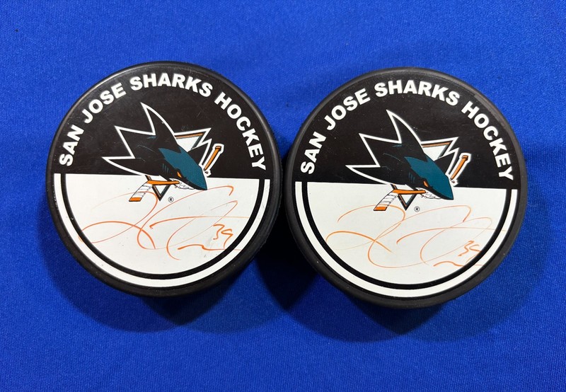 San Jose Sharks Lot of 2 Pucks both signed by Logan Couture