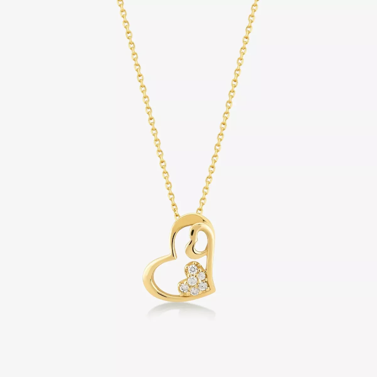 Gold heart necklace with cheap diamond in the middle