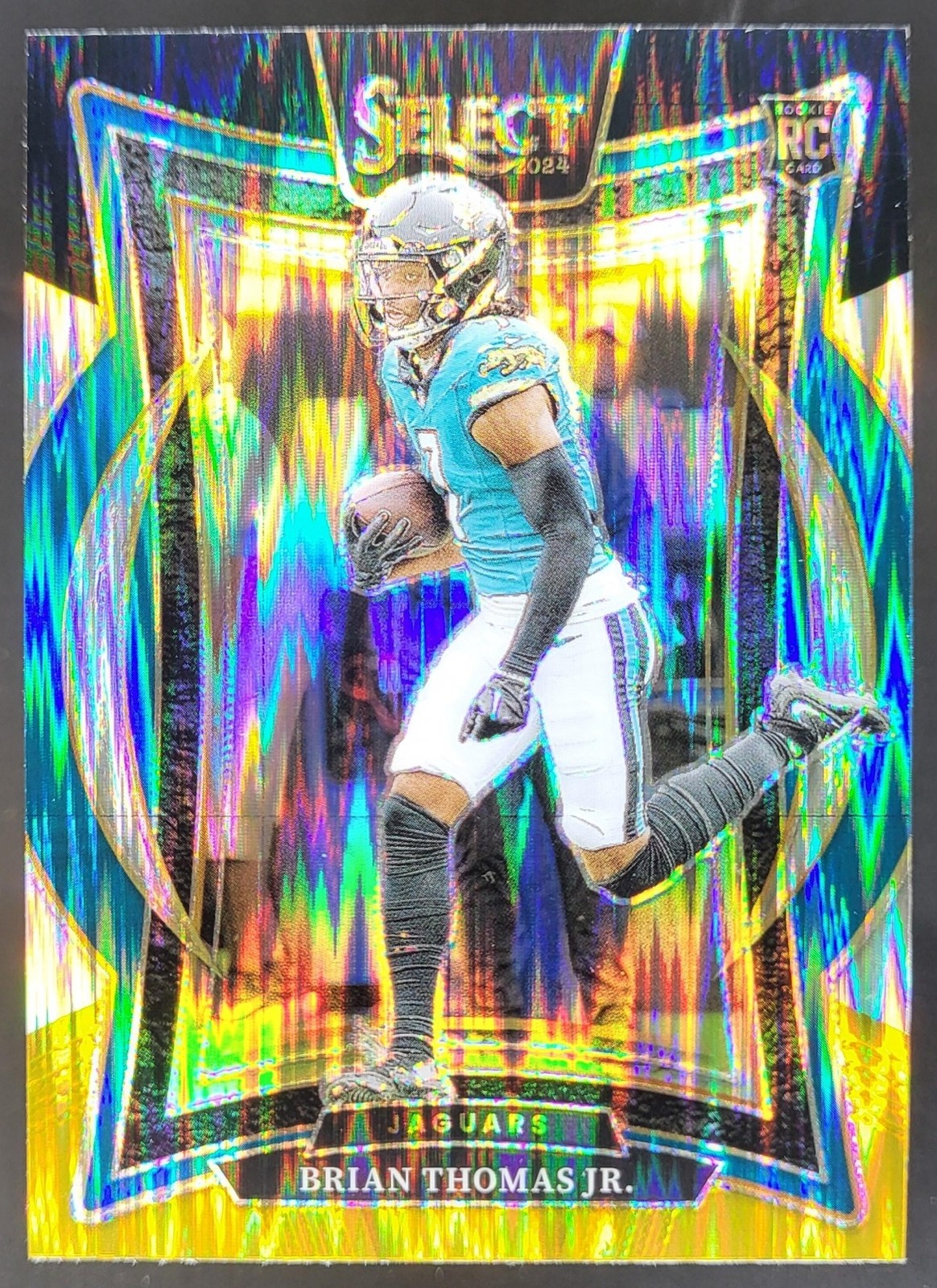 2024 Panini Select Brian Thomas Jr. Concourse Black and Gold Prizm Shock RC JT4
