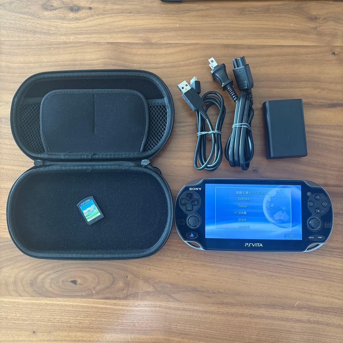 PS Vita PCH-1100 Crystal Black Wifi Model Includes 8GB Memory Card, Charging Cable, and Premium Protective Case