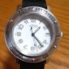 Montre homme HERMES Clipper Divers CL7.710 lunette argentée cadran blanc quartz