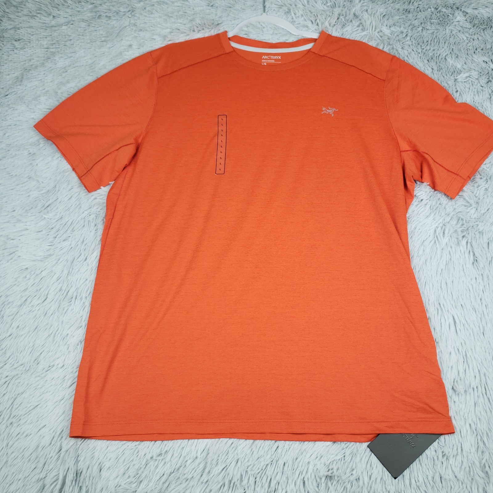 Nuova camicia Arc'teryx uomo L Cormac girocollo arancione Solaris Heather Performance