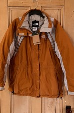 The North Face Womens Heavy Nylon No Hood Zip Parka Jacket Large Orange AN NWT