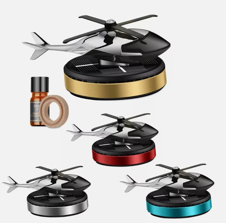 Ambientador de aire para automóvil difusor de aromaterapia giratorio de energía solar en forma de helicóptero Foto 2 de 4