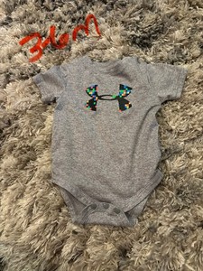 Boys Under armour bodysuit size 3-6 months short sleeve multicolor