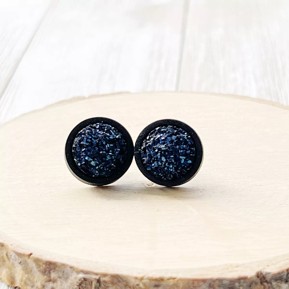 Large black shop stud earrings