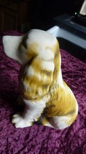 Vintage fairing, seated sad eyed spaniel dog. 16cm tall