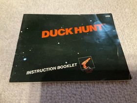 Grey Nintendo Entertainment System (NES) Zapper + Duck Hunt Game