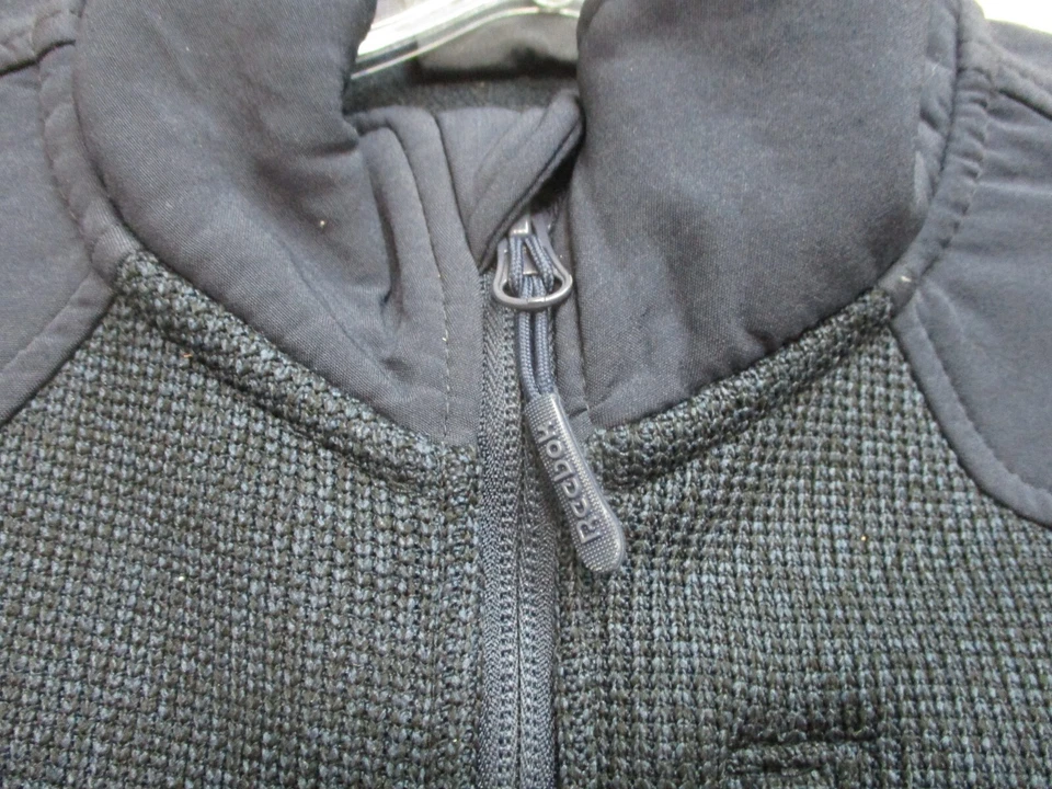 Suéter Reebok Mediano Juvenil Azul Marino Cremallera Completa Bolsillos Cuello Alto Logo Niños YMD Foto 3 de 4