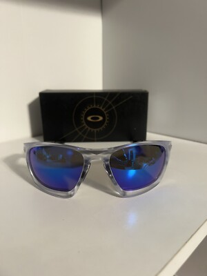 Brand New Oakley Lateralis 009431-0660 Clear Frame Prizm Sapphire Lenses
