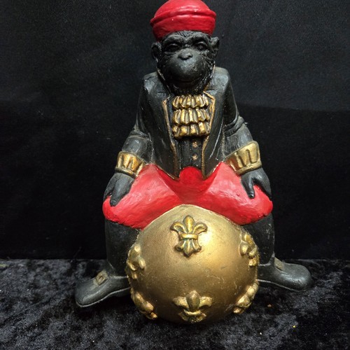 Art Deco Style Monkey Butler in Fez Hat and Tuxedo with Fleur- de-lis Sphere
