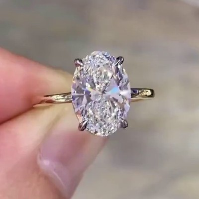 3,65 ct Ovalschliff Moissanit Solitär Verlobungsring in massivem 9 kt bicolor Gold