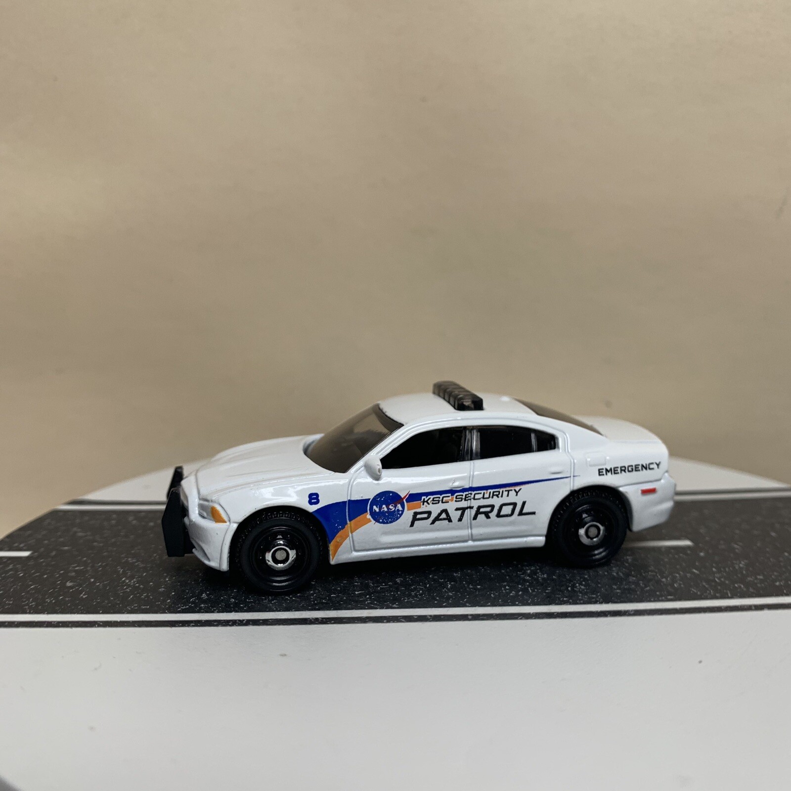 2022 Matchbox MBX Highway Dodge Charger Pursuit NASA KSC Security Car #86 White