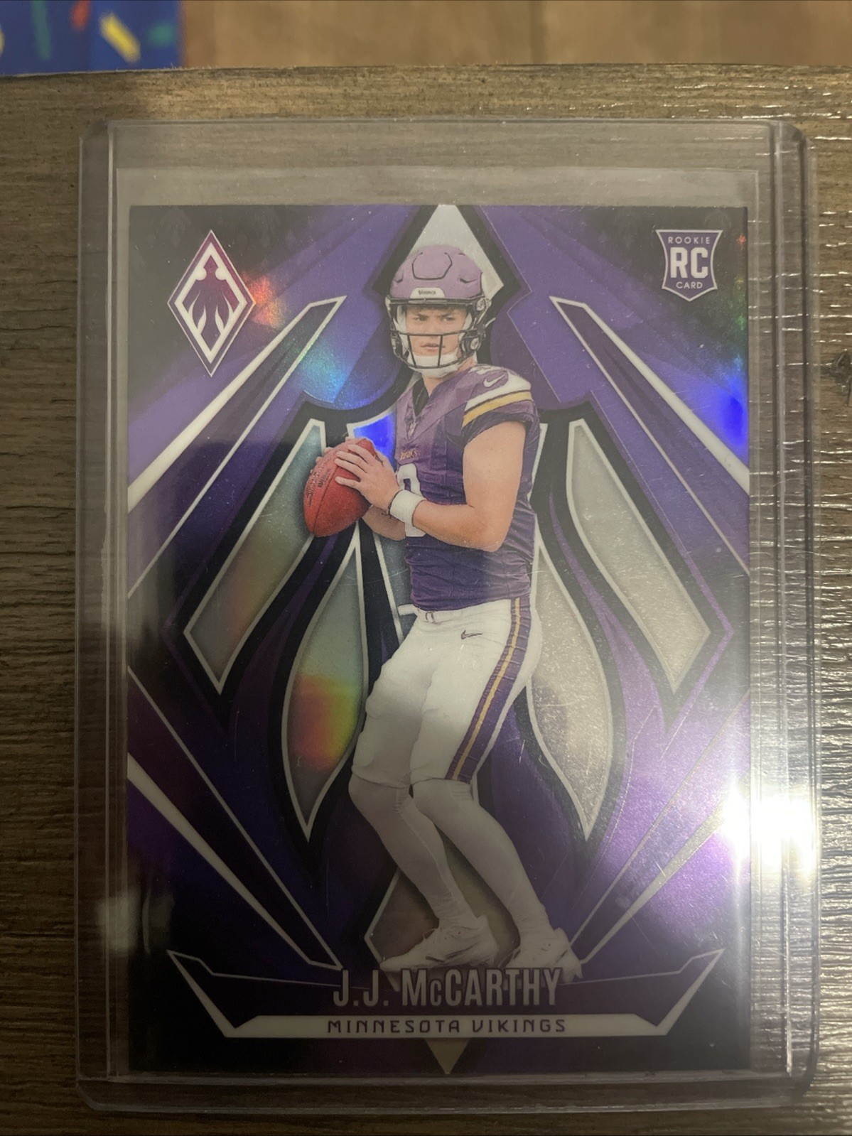 2024 Panini Phoenix - Rookies J.J. McCarthy #185 Purple (RC)