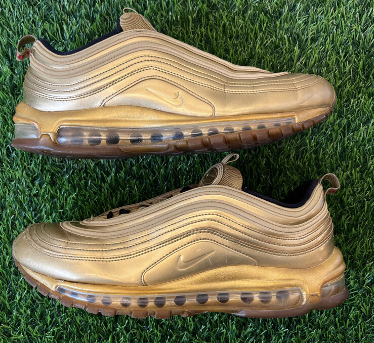 gold air max 97 on feet