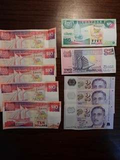 SGD 61 Singapore Dollars in notes