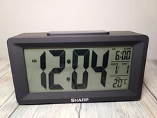 Sharp Digital Alarm Clock With On/ Off Display Night Light Battery Operate NOB