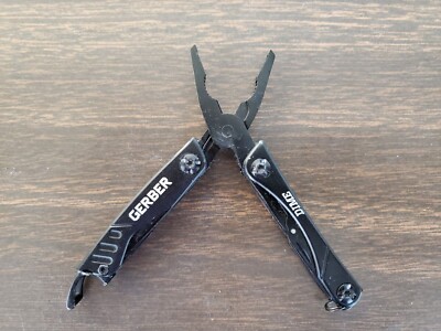One Gerber Dime Pocket Multitool TSA Good Condition!