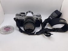 Canon AE-1 35mm SLR Film Camera w/ 50mm FD 1:1.8 And Filter Working Great