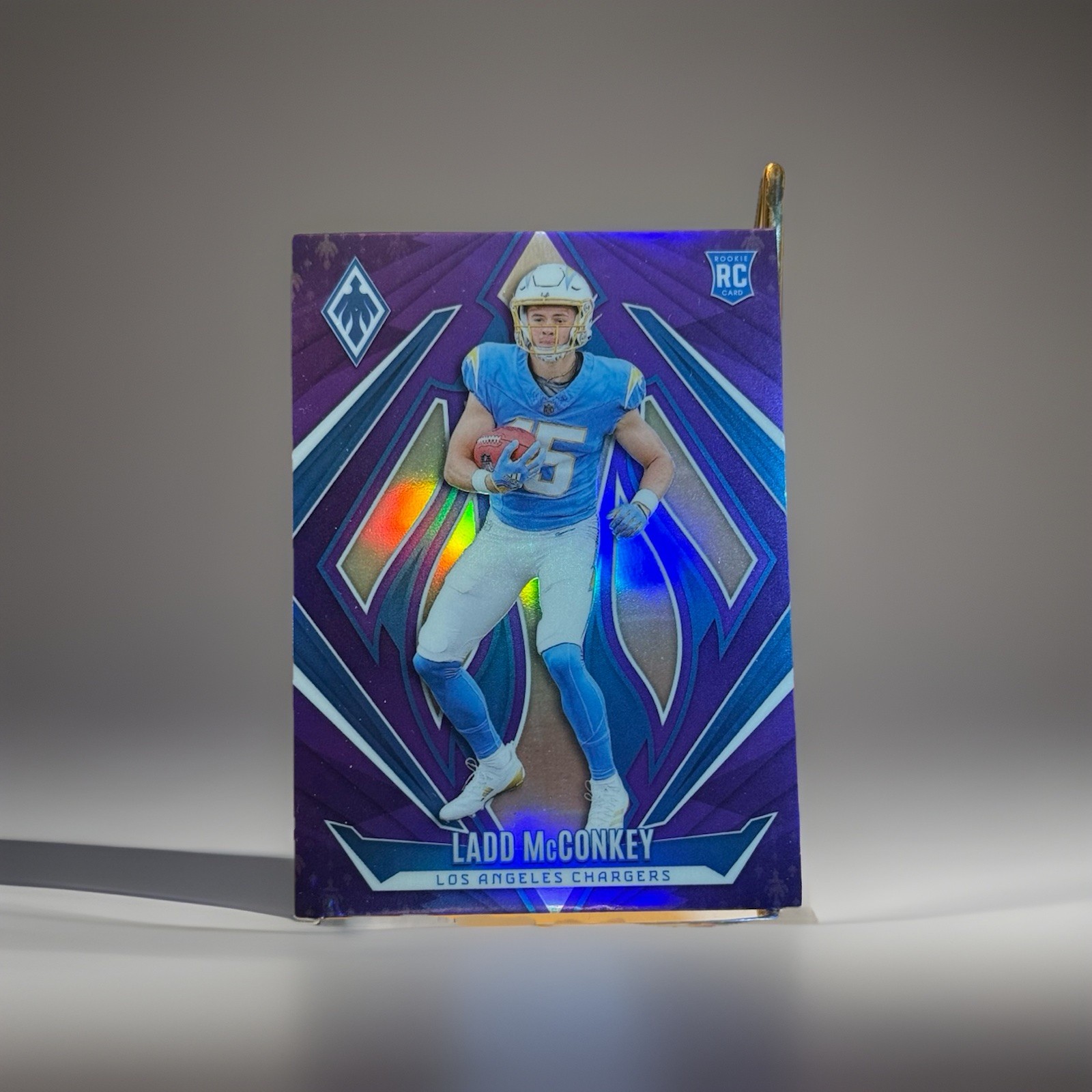 2024 Panini Phoenix Rookies Purple Ladd McConkey #216 Rookie RC