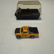  1919 AFX DATSUN BAJA PICKUP BUTTERSCOTCH YELLOW HO SLOT CAR IN CASE