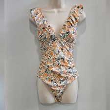 Floral One Piece Swimsuit woth ruffled neckline and tie back size large NWT