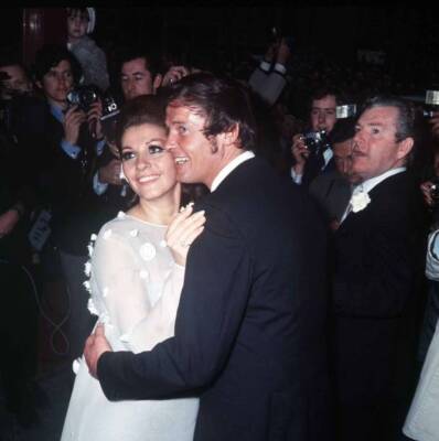 Roger Moore with his bride Luisa Mattioli after their wedding cere- 1969 Photo