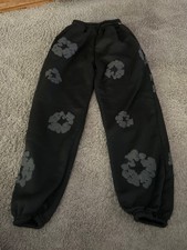 denim tears black sweatpants with flowers size medium