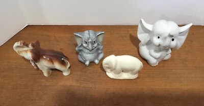 A Herd Of 4 Small Vintage Elephant Figurines 