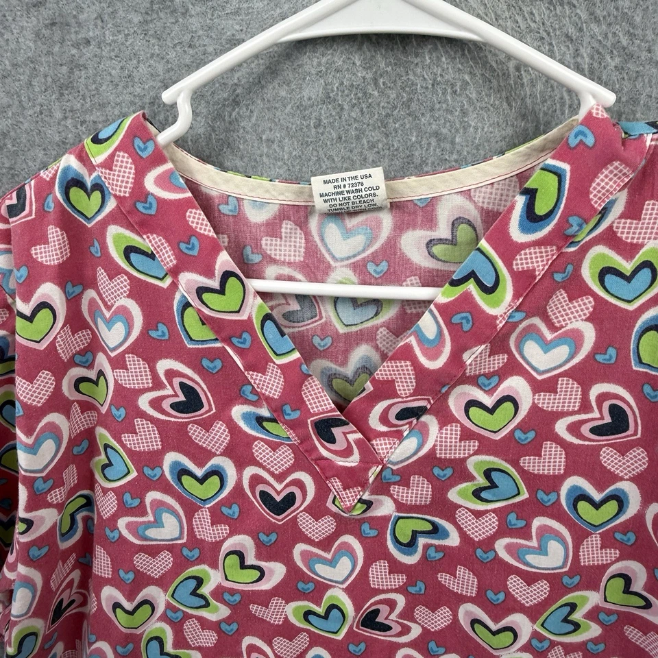 Exfoliantes Uniforme Tafford Mujer Corazones Rosa Medianos Foto 2 de 4