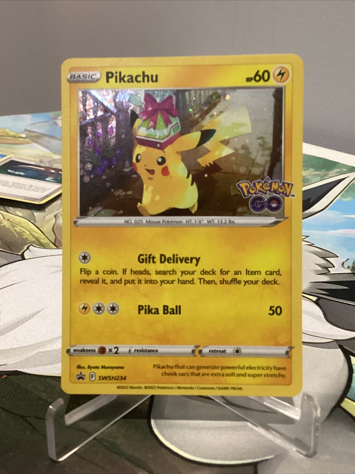 Pikachu SWSH234 Pokemon Go Cosmos Holo Black Star Promo Pokemon Card - Mint