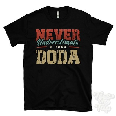 NEVER UNDERESTIMATE A TRUE DODA T-SHIRT - Wear Your Name Proudly
