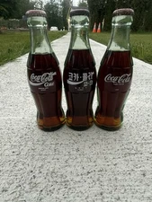 Set Of 3CocaCola Collectible commemorative Korea Spain USA  Unopened CokeBottles
