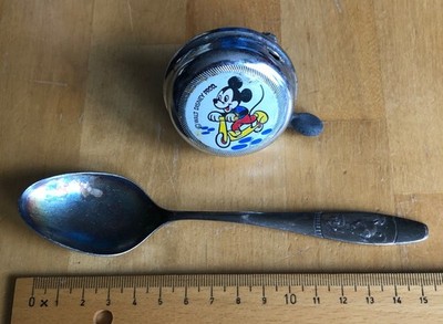 Mickey Mouse Fahrradklingel und versilberter (?) Donald Duck Löffel