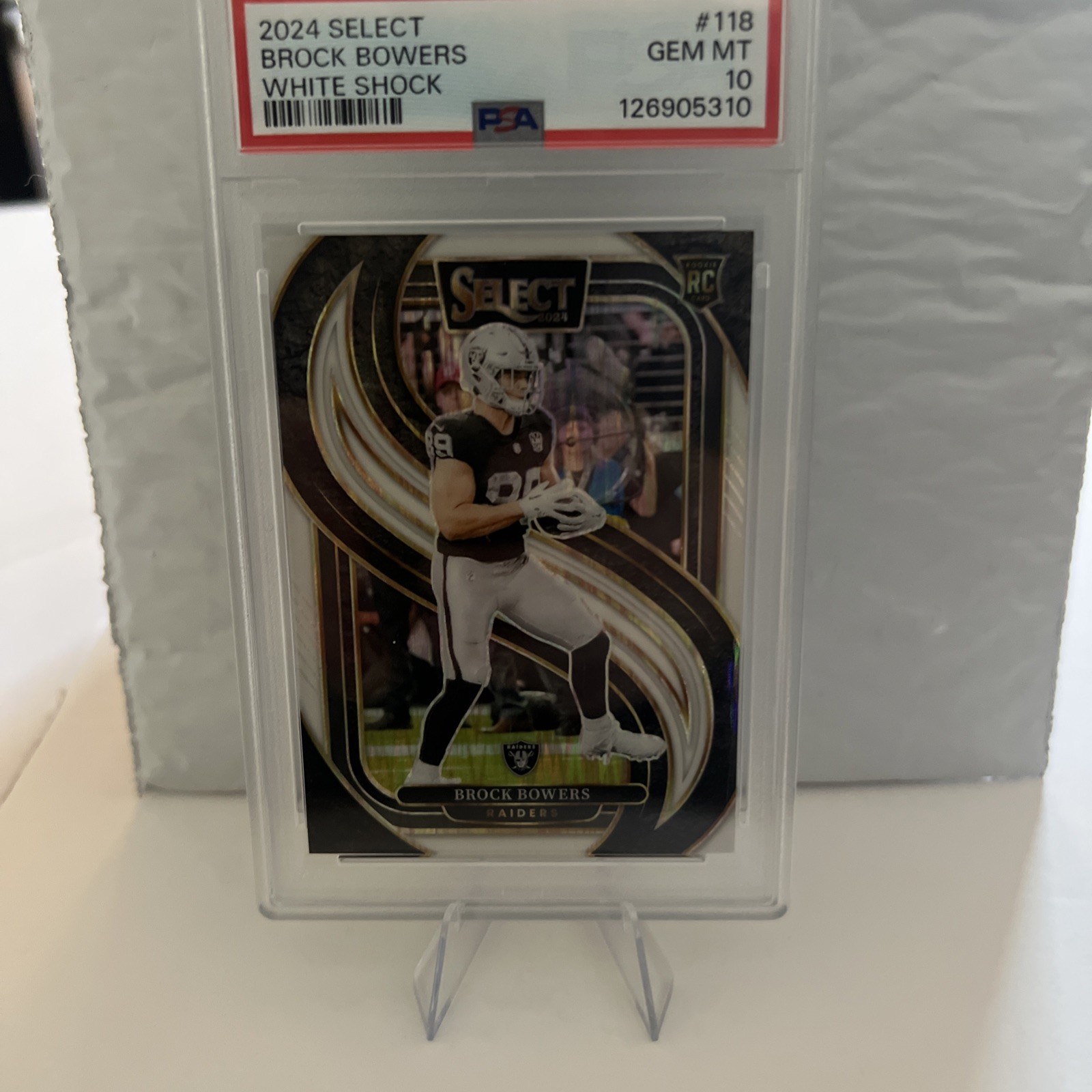 2024 Panini Select Premier Level Brock Bowers #118 White Shock /199 GEMMT PSA 10