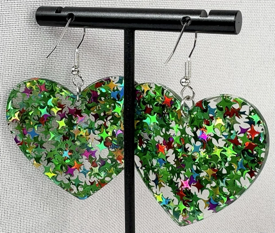 Pendientes colgantes grandes de plástico verdes con gancho brillante de estrella Foto 4 de 4